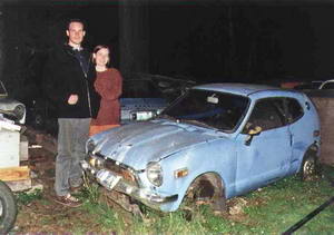 James & Elise by a blue Honda Z600 Coupe